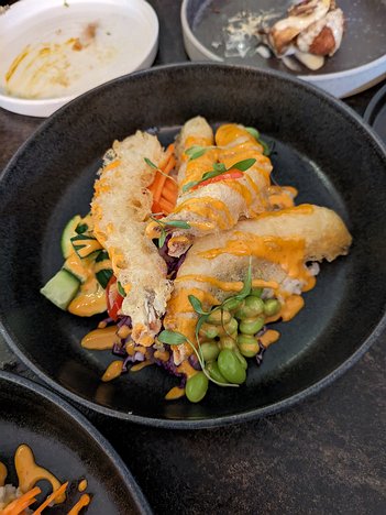 20231223_PXL134312914_Pixel7a-JEB Tempura prawn poke bowl, steamed sushi rice topped with edamame, cucumber, cabbage, avocado purée & sriracha mayo